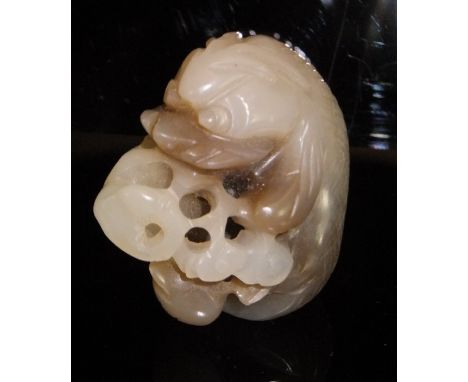 A Chinese carved jade or agate figure of a fish by coral, 3.7 cm long   CONDITION REPORTS  Some light scratches, some small c