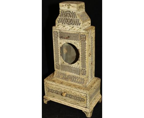 An early 19th Century Napoleonic French prisoner of war wood and bone watch stand as a cabinet with all over pierced and carv