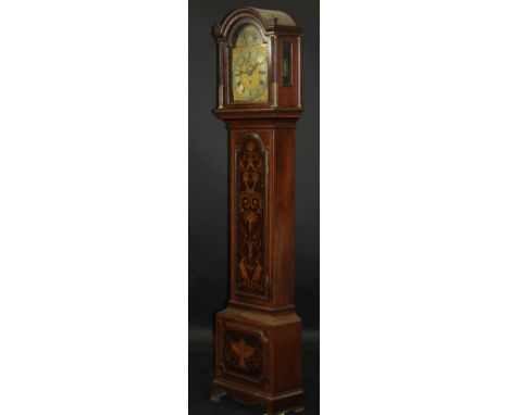 A 19th Century mahogany long case clock with arched top over a marquetry inlaid door featuring birds and flowers and marquetr