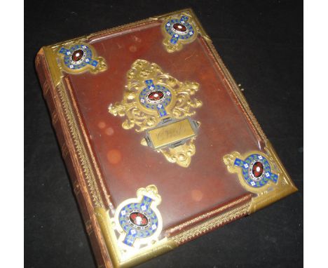 A 19th Century French photograph album, the tooled and gilded leather binding/cover with Gothic style gilt metal and enamel d