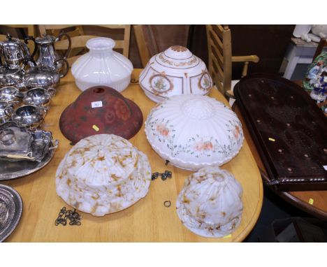 Five various opaque glass ceiling light shades, and a milk glass oil lamp shade 