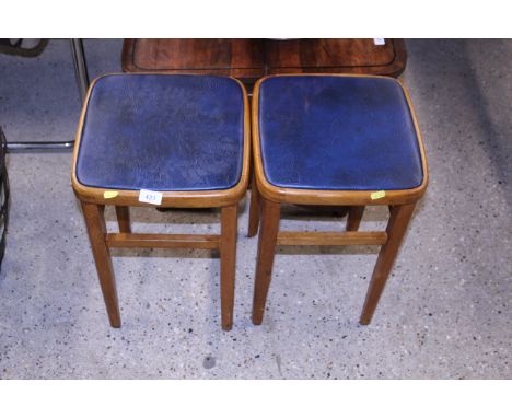 A pair of vintage beech kitchen stools 