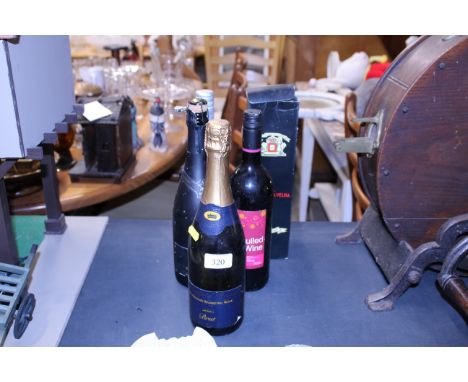 A boxed vintage port and four various other bottles