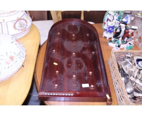 A Past Times bagatelle board