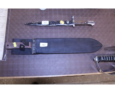 A WWII machete and scabbard 