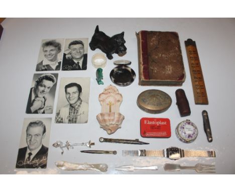 A box containing a folding rule, photographic print cards, a Pickwick Club book, various ornaments etc.
