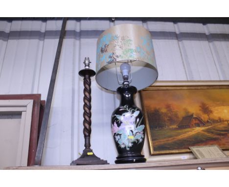 A floral decorated baluster table lamp with shade; and a gilt twist table lamp base 