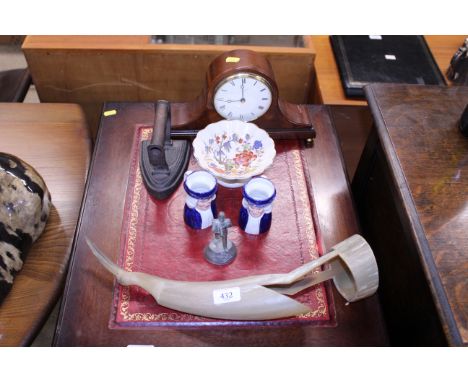 A mantel clock by Comitti of London; a vintage flat; two character jugs by Wood & Sons; a carved horn bird etc.