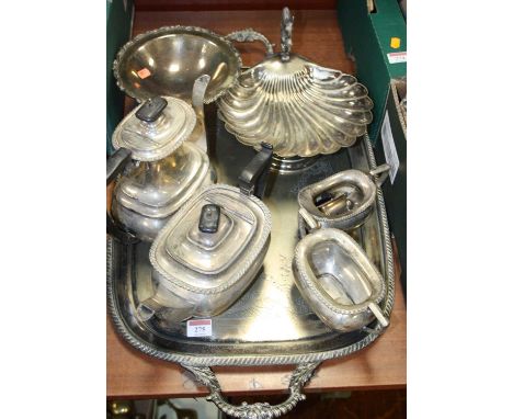 Various silver plated wares, to include a teapot, coffee pot, and serving tray 