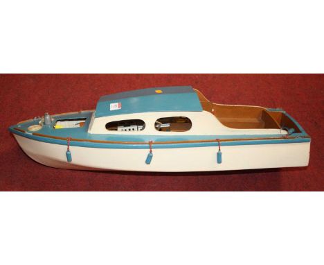 A painted wooden model boat, 64cm 