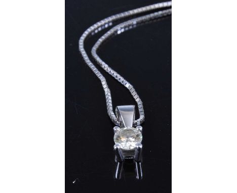 An 18ct white gold diamond pendant, the four claw set round brilliant weighing approx 0.4 carats, to a finelink neck chain, g