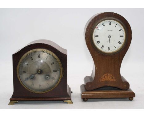 An Edwardian mahogany and ebony strung mantle clock having a convex silvered dial with Roman numerals and Arabic outer scale,