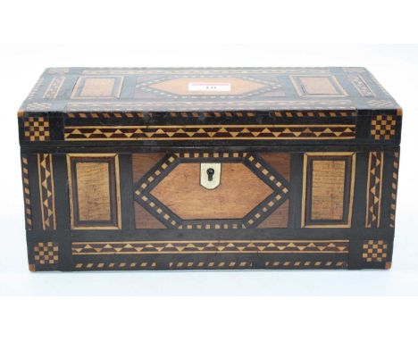 A Victorian specimen wood tea caddy of rectangular form having geometric design inlaid with oak, ebony and boxwood, with part