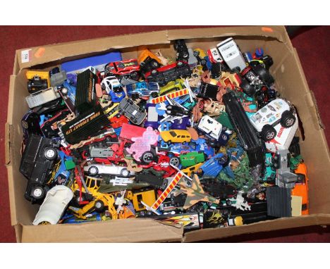 A box of various diecast model vehicles
