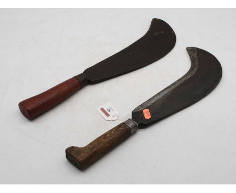 A WWII military bill-hook, the 27cm curved steel blade with broad arrow dated 1944, on turned beech handle, length 41cm; toge