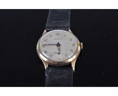A Garrard gent's 9ct gold cased manual wind wristwatch, having signed silvered dial with luminous Arabic numerals, subsidiary
