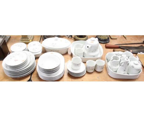 A Brazilian part dinner and tea service, on a white ground with printed floral decorationCutlery marks throughout.One of the 