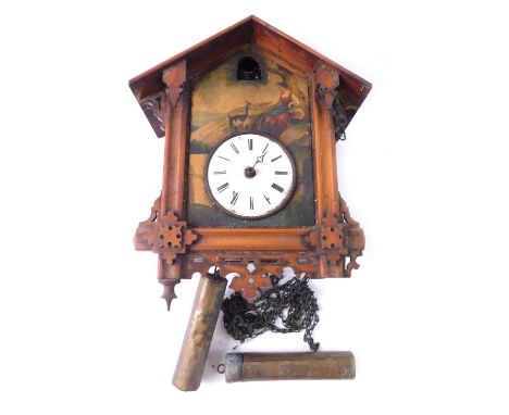 A heavily carved late 19thC Swiss cuckoo clock, painted with a scene showing Heidi with 9cm diameter enamel dial in heavily c