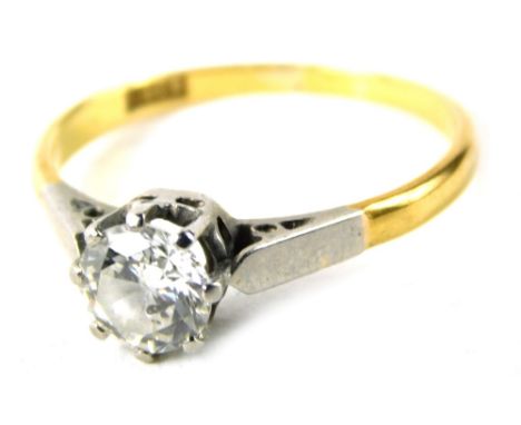 An 18ct gold diamond solitaire ring, with round brilliant cut diamonds approximately 0.36 carats, in a raised basket claw set