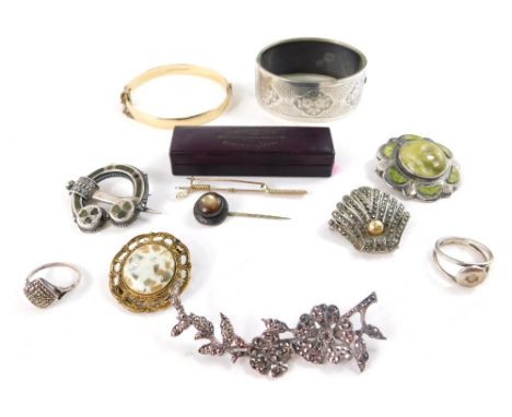 A group of silver and other costume jewellery, comprising a Victorian silver hinged bangle, with foliate detail, silver scarf