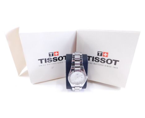 A Tissot 1853 wristwatch, with mother of pearl finish 3cm diameter dial, surrounded by small diamonds with Arabic numerals an