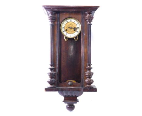 A Vienna wall clock, in walnut case, simulated enamel dial, 70cm high. (AF)