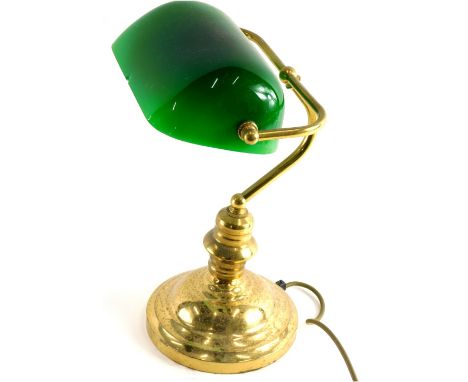 A 1930s style brass desk lamp, with articulated green shade, and modern electric feature, 40cm high.