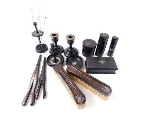 Various early 20thC ebonised dressing table items, some with silver mounts to include a pair of clothes brushes, 18cm wide, a