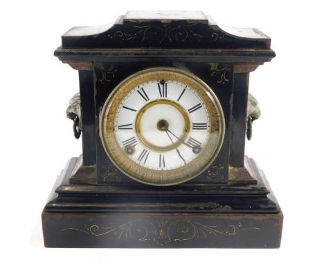 A Victorian slate and marble mantel clock,  with 13cm diameter Roman numeric dial, flanked by lion mask, handles on a stepped