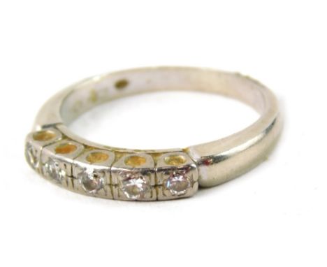 A diamond half hoop dress ring, set with five panels of tiny diamonds, each illusion set, approximately 0.37 carats overall, 