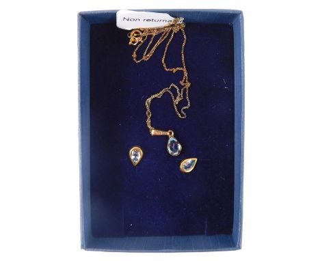 A 9ct gold aquamarine pendant and chain, set with tear drop shaped aquamarine in a 9ct gold setting on fine link chain, 8g al