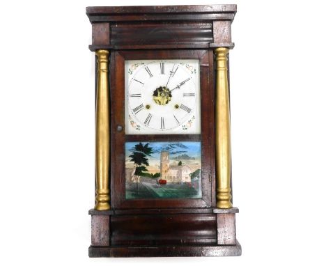 A late 19thC American wall clock, by The Waterbury Clock Company of based in Waterbury Connecticut, in mahogany and parcel gi