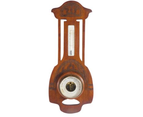 An early 20thC Art Nouveau mahogany two dial barometer and thermometer, with a 10cm diameter dial in pierced case, with styli
