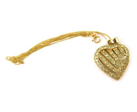 A 9ct gold peridot set heart shaped pendant and chain, the pendant 2cm high,  on a fine link chain, 15cm long. 6g all in. box
