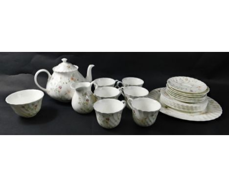 A Wedgwood Campion pattern part tea service, comprising serving plates, 26cm wide, teapot, cups, saucers, milk jugs, sugar bo