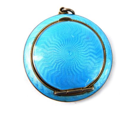 A George V silver and blue enamel patch box, with line decoration and interior mirror, Birmingham 1925, 4cm diameter (the mir
