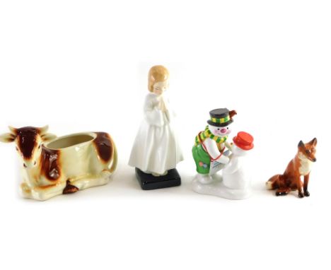 A Goebel butter dish, Jersey cow, 10cm high, Beswick seated fox, a Royal Doulton Frosty Family figures, 10cm high, Royal Doul