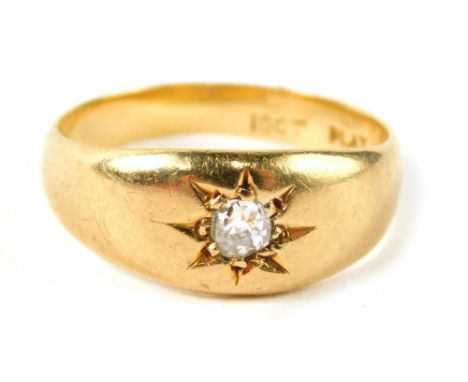 A diamond solitaire ring, with old cut diamond in star setting, approx. 0.15ct, on a yellow metal band, marked 18ct plat, rin