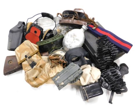 Various mixed army surplus pouches, holsters, belts and goggles. 