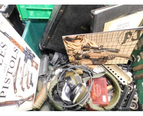Various ex-army surplus metal parts and gun cleaning rods, various other related booklets, etc. (a quantity) 