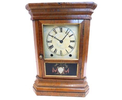 A late 19thC American mantel clock by Seth Thomas, in an ash case with painted dial, the door inset verre eglomise panel of a