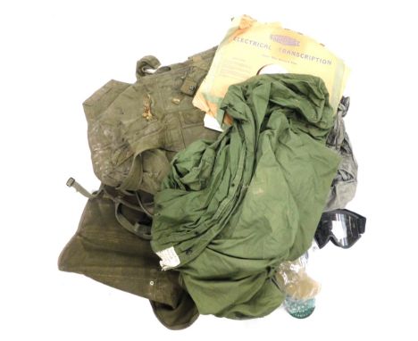 A US army World War Two sleeping bag, various other items, respiratory masks, etc. (a quantity)