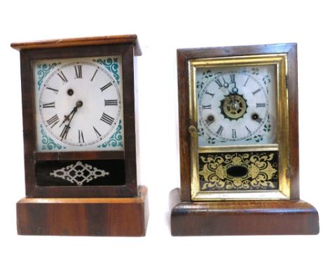 A late 19thC American mantel clock by M.L. Gilbert of Winchester, Connecticut, in a rosewood case, the dial painted with flow