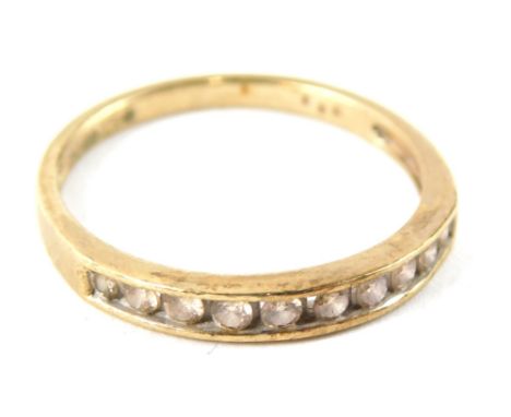 A 9ct gold diamond half hoop dress ring, diamond totalling 0.25ct, ring size O, 1.8g all in,  boxed.