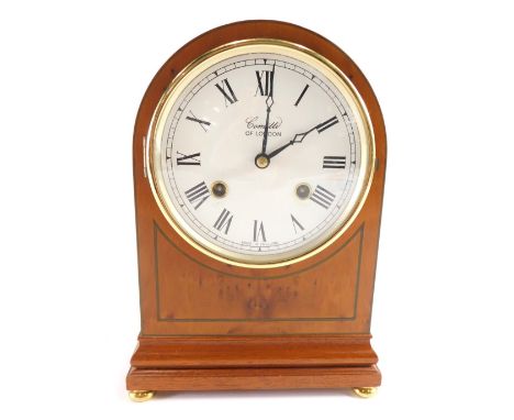 A yew wood finish dome topped mantel clock, by Committi London, with  12cm diameter dial,  in domed case on compressed gilt m