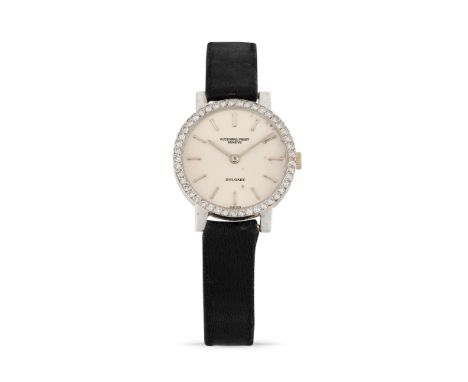 Audemars Piguet Calatrava retailed by Bulgari, 60s18k white gold diamond-set round case, n.48244.Cream coloured dial, applied