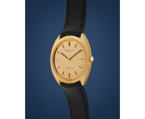 Audemars Piguet 5302BA New-old-stock, 60s18k gold extra-thin tonneau case, n.49540, screw back.Champage dial, applied enamell