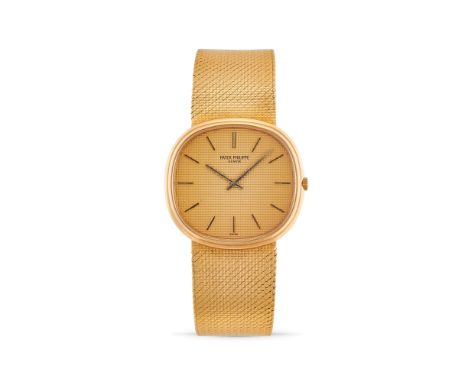 Patek Philippe Ellipse Jumbo 3739/1, 70s18k gold elliptical case, n.2775356.Gold dial with guilloché finishing, applied ename