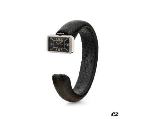 Jaeger-LeCoultre driver retailed by Astrua, 30sStainless steel rectangular case, n.42225.Black dial, painted arabic numerals 