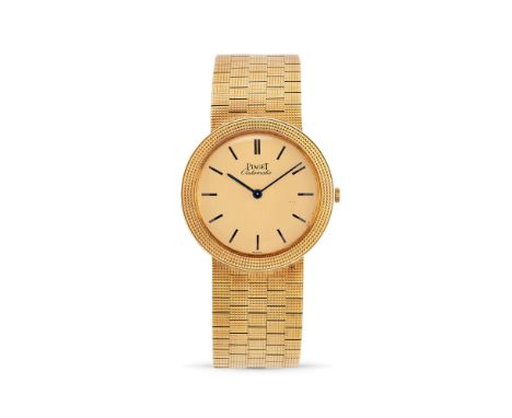 Piaget Extra-Thin 12611, 80s18k gold extra-thin round case with clous-de-Paris finishing, n.80422.Champagne dial, painted ind